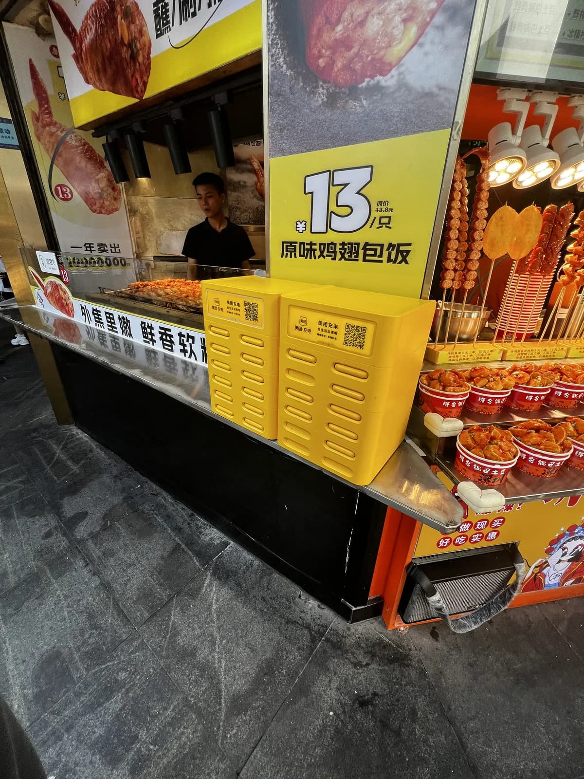A rental station on the counter of a street food stall in China
